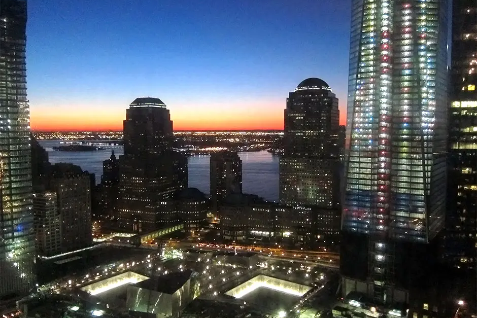 A view of the city skyline at night.